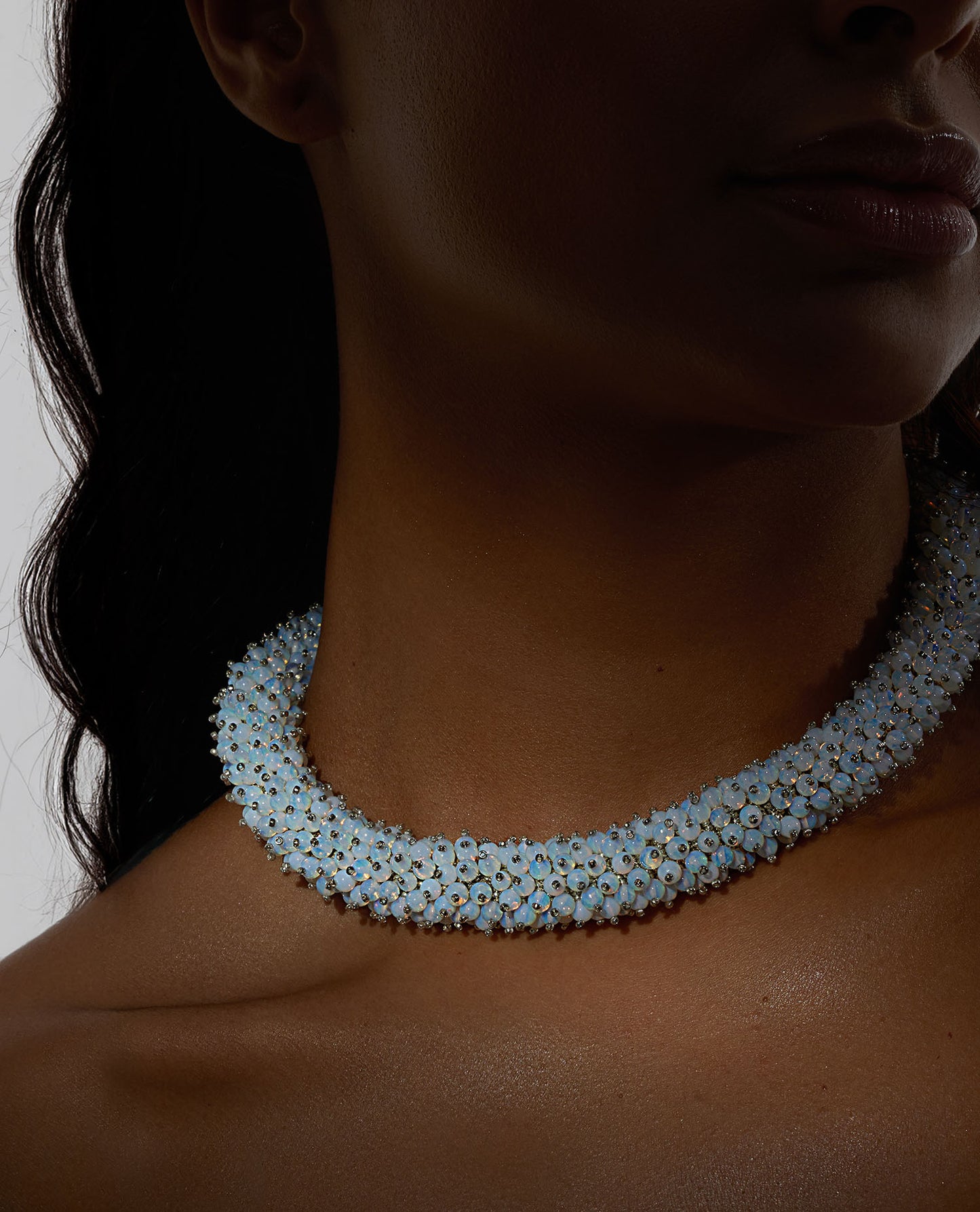 Radiant opalite necklace featuring opalescent beads in a bold rope design with a silver T-bar clasp, 45 cm in length, perfect for haute couture styling.