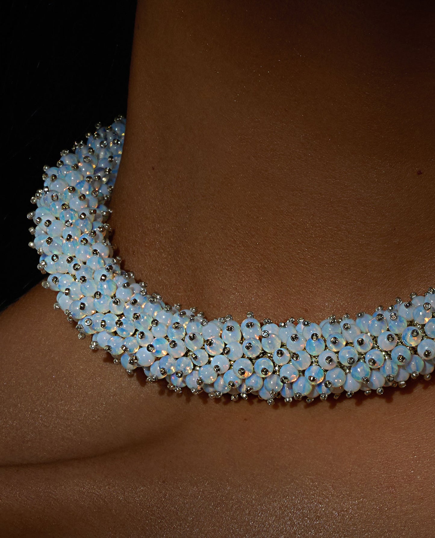 Radiant opalite necklace featuring opalescent beads in a bold rope design with a silver T-bar clasp, 45 cm in length, perfect for haute couture styling.