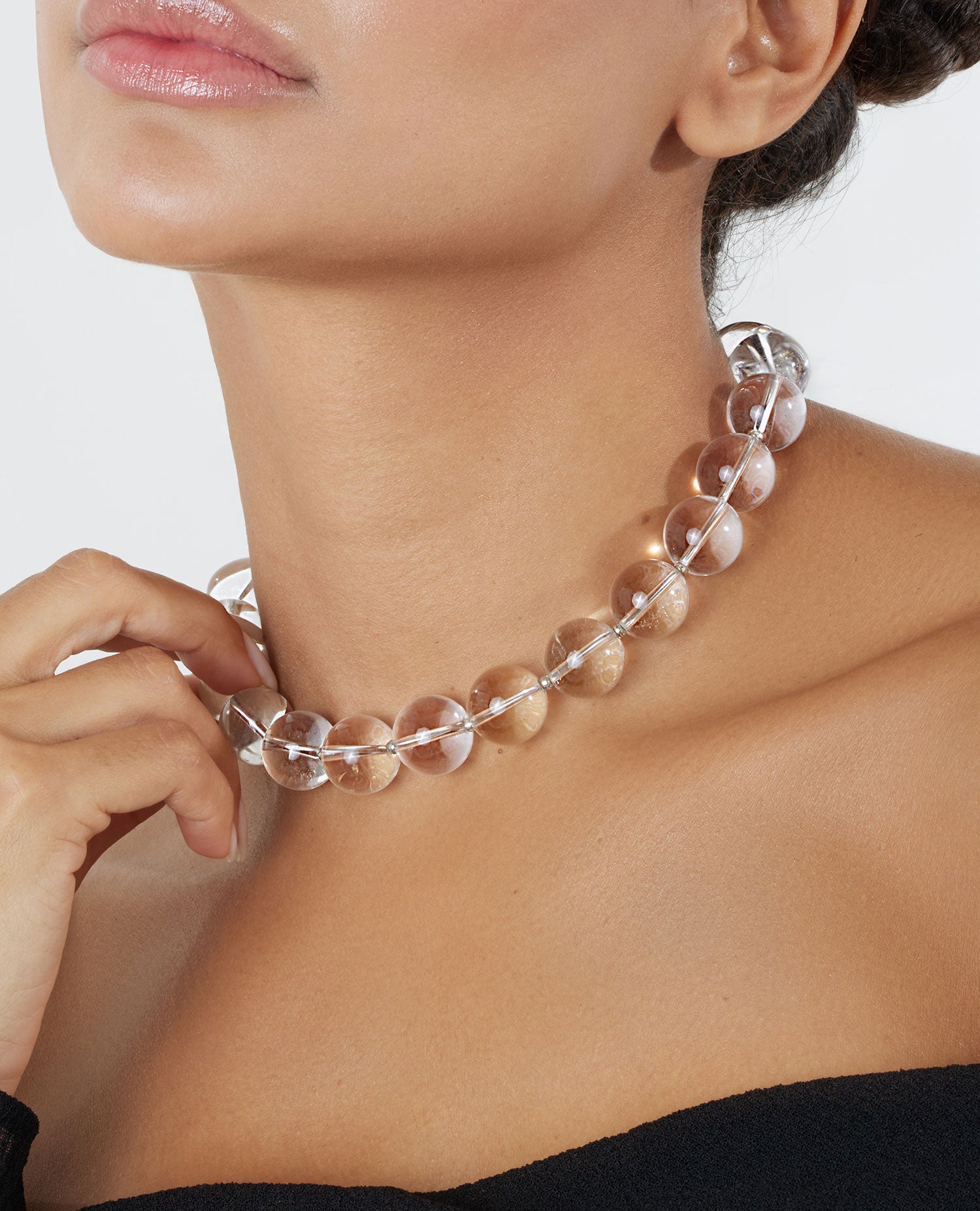 Quartz big beads short necklace featuring transparent quartz gemstones with a stainless steel clasp, 45 cm in length, offering a timeless and elegant design.