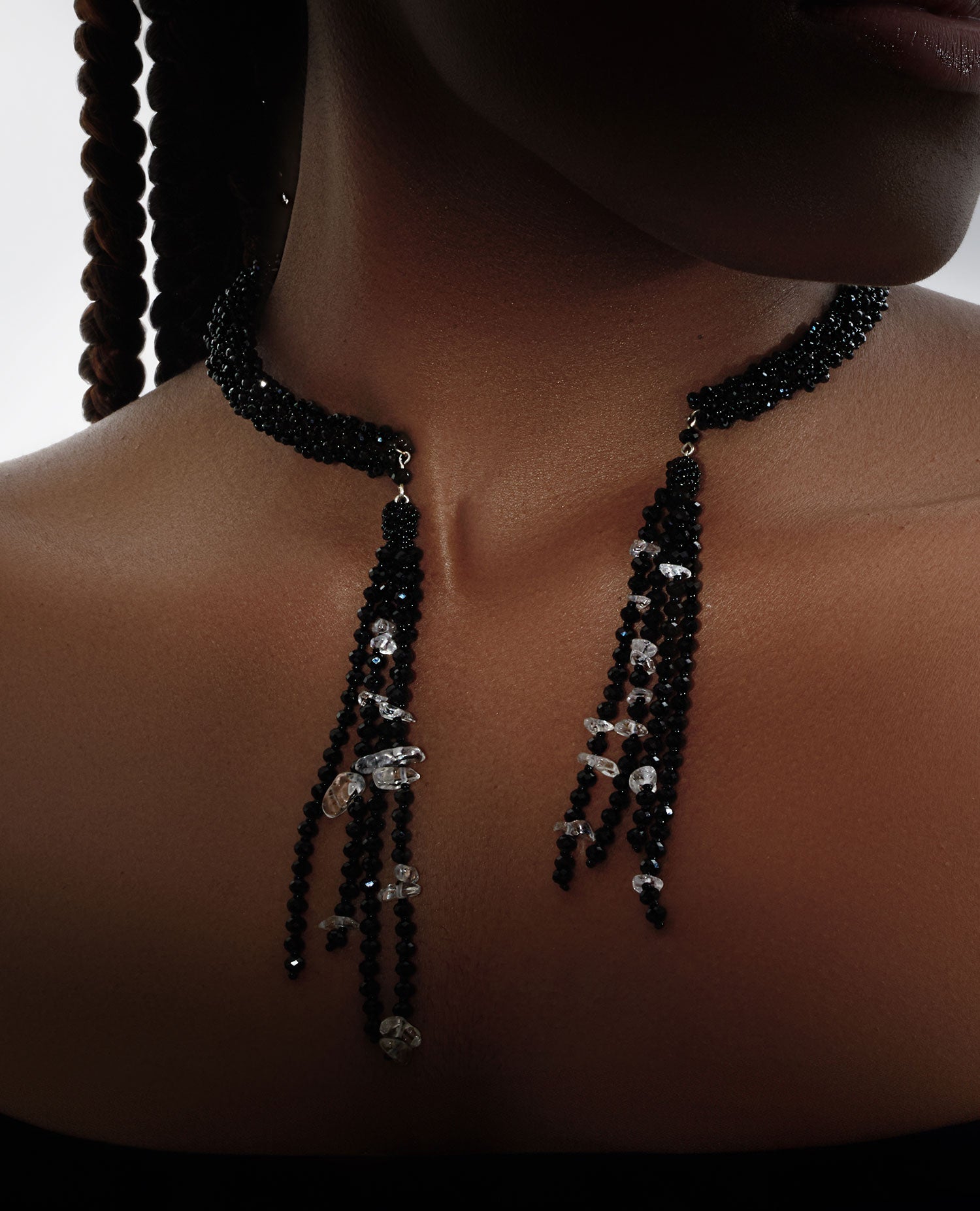 Spinel and quartz open choker featuring sparkling black spinel and clear quartz stones in an adjustable design, tailored for comfort and elegance.