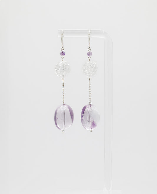 Elegant chain earrings featuring shimmering Crackle Quartz and a deep purple oval Amethyst stone, suspended from silver chains with hooks.