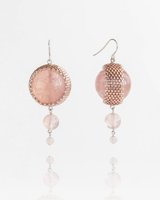 Double rose quartz earrings featuring two radiant pink stones with silver hooks, 6 cm in length, offering natural elegance.