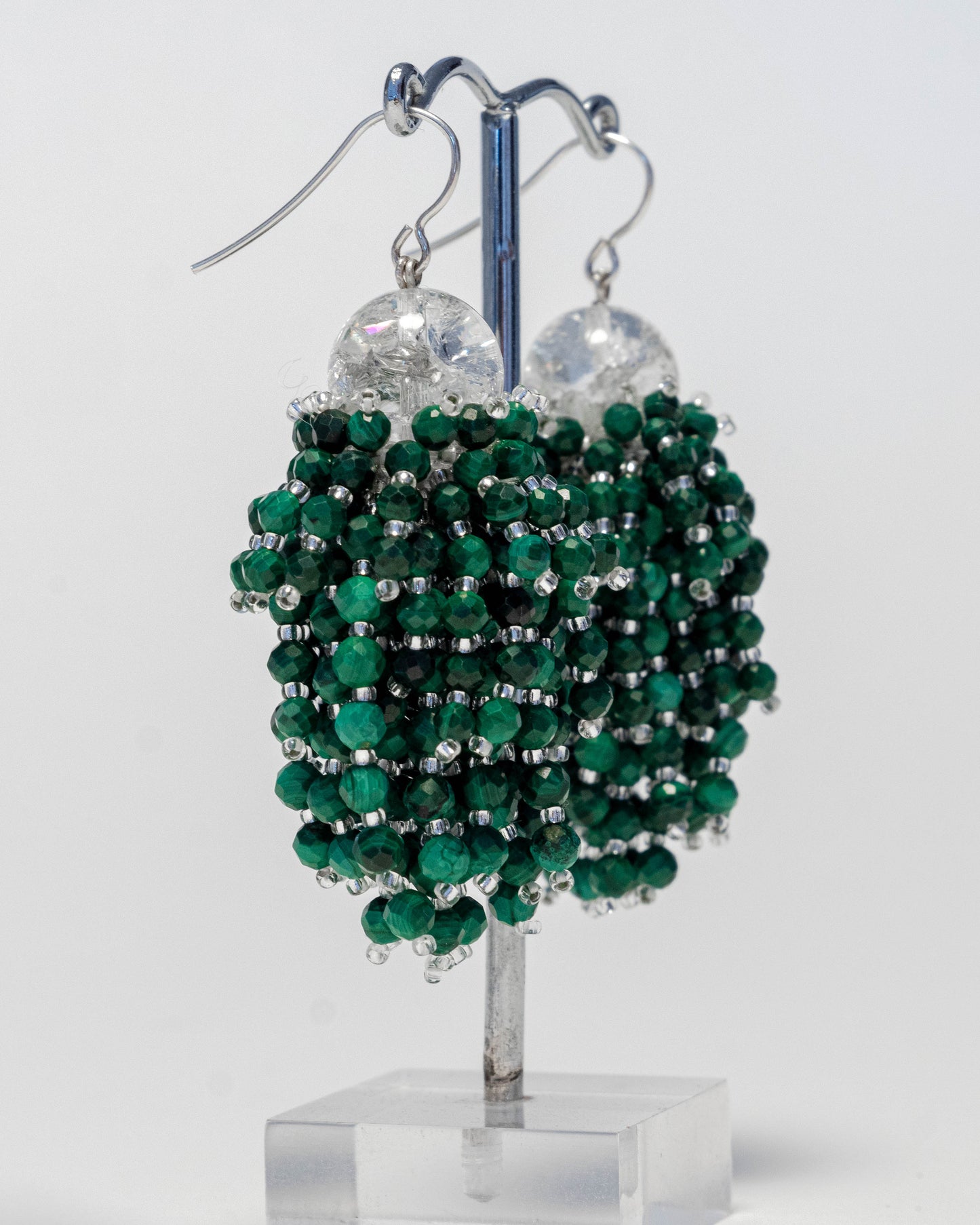 Green malachite fringe earrings featuring vibrant natural gemstones with silver hooks, 6 cm in length, offering bold and elegant design.