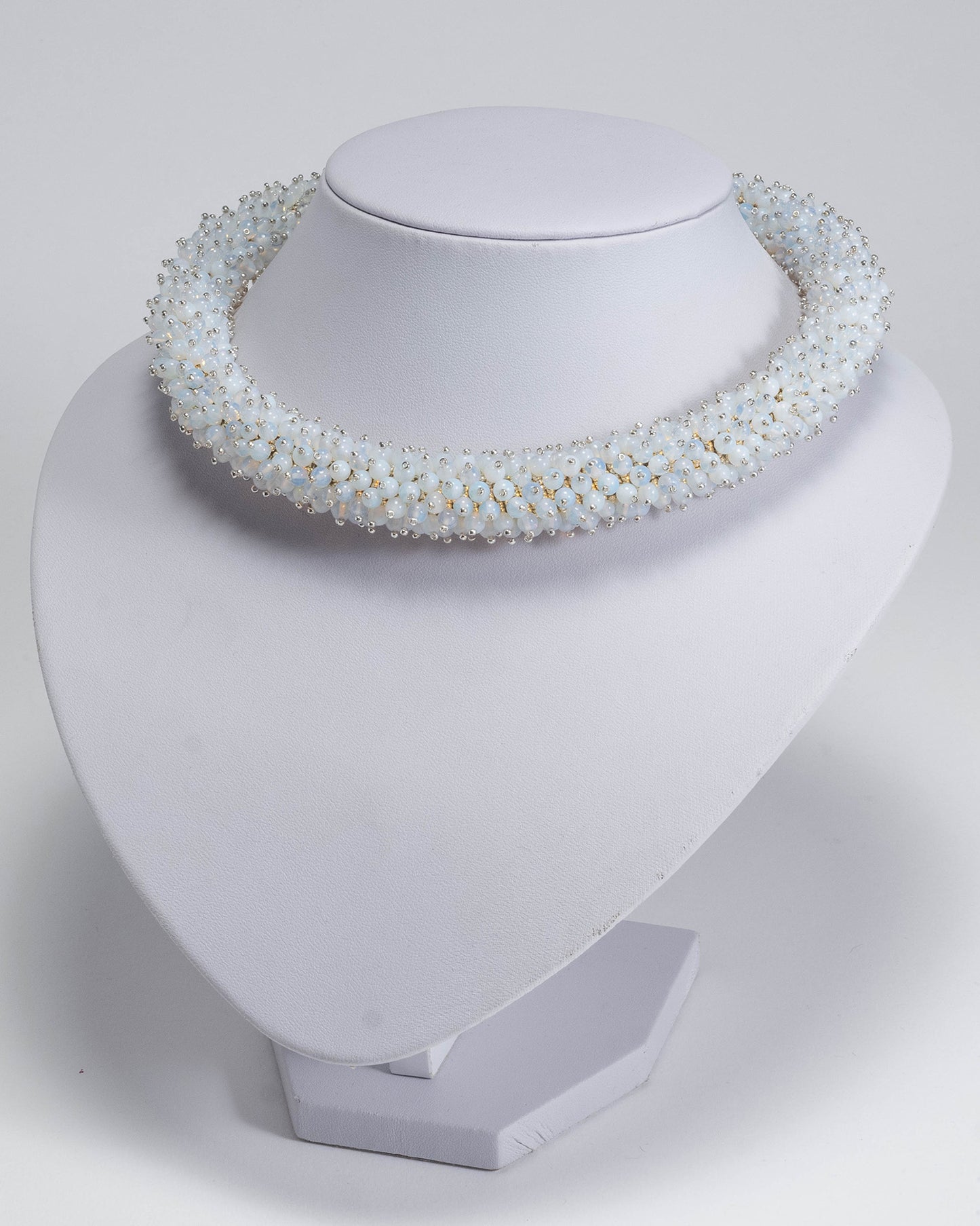 Radiant opalite necklace featuring opalescent beads in a bold rope design with a silver T-bar clasp, 45 cm in length, perfect for haute couture styling.