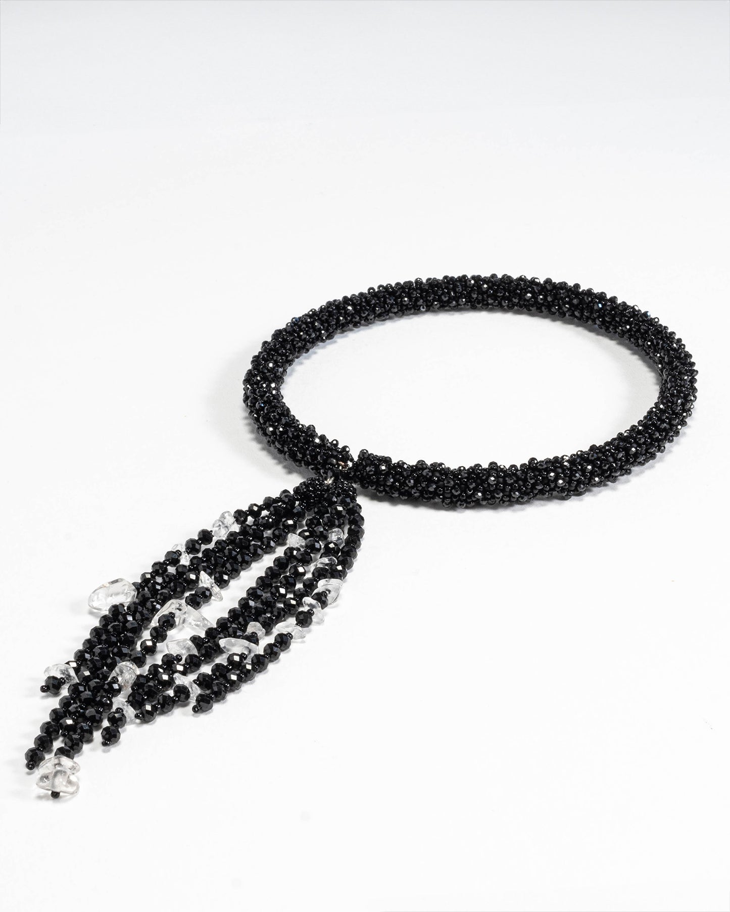 Spinel and quartz open choker featuring sparkling black spinel and clear quartz stones in an adjustable design, tailored for comfort and elegance.