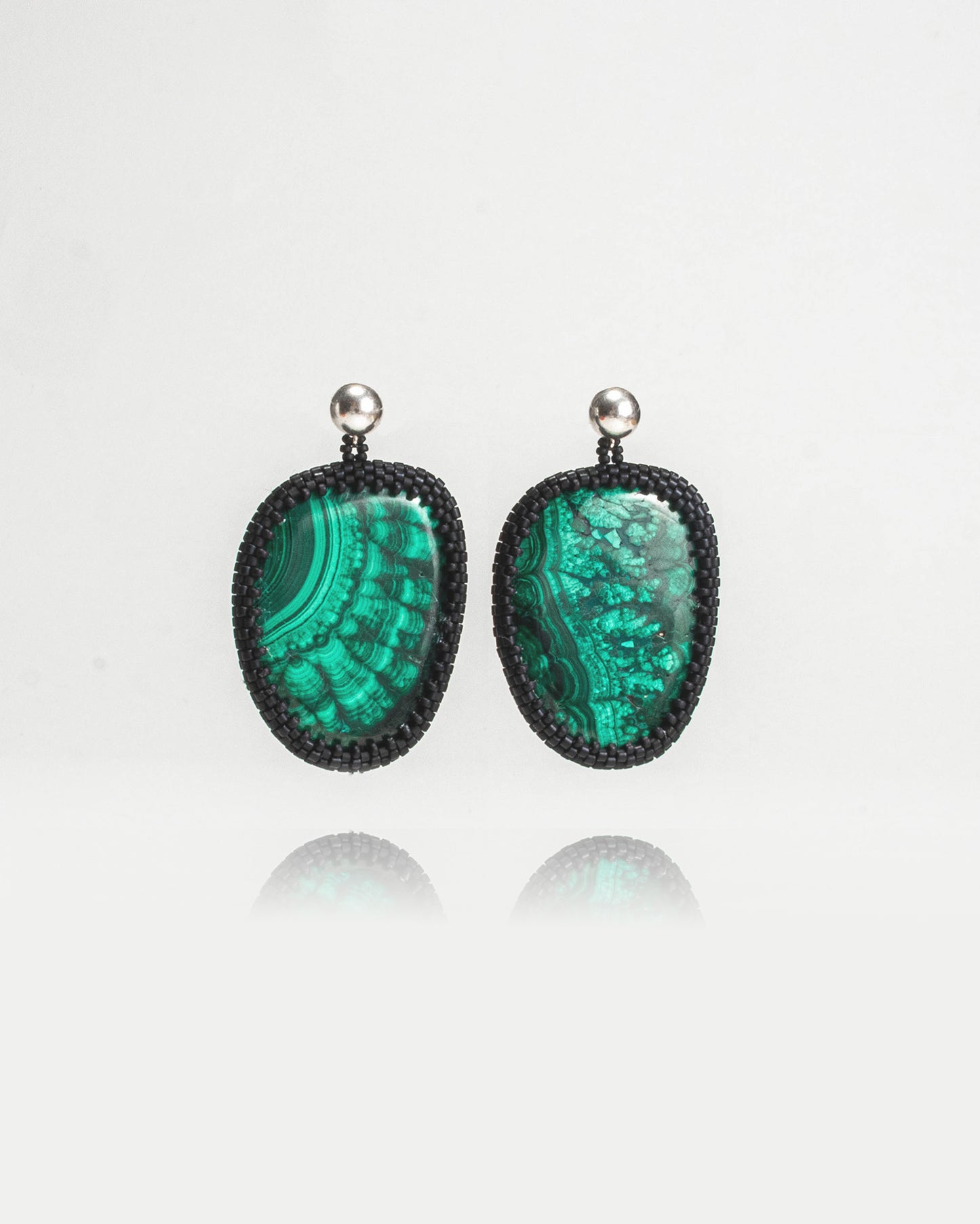 Malachite big stone earrings featuring vibrant green natural gemstones with silver studs, 5 cm in length, offering bold elegance.