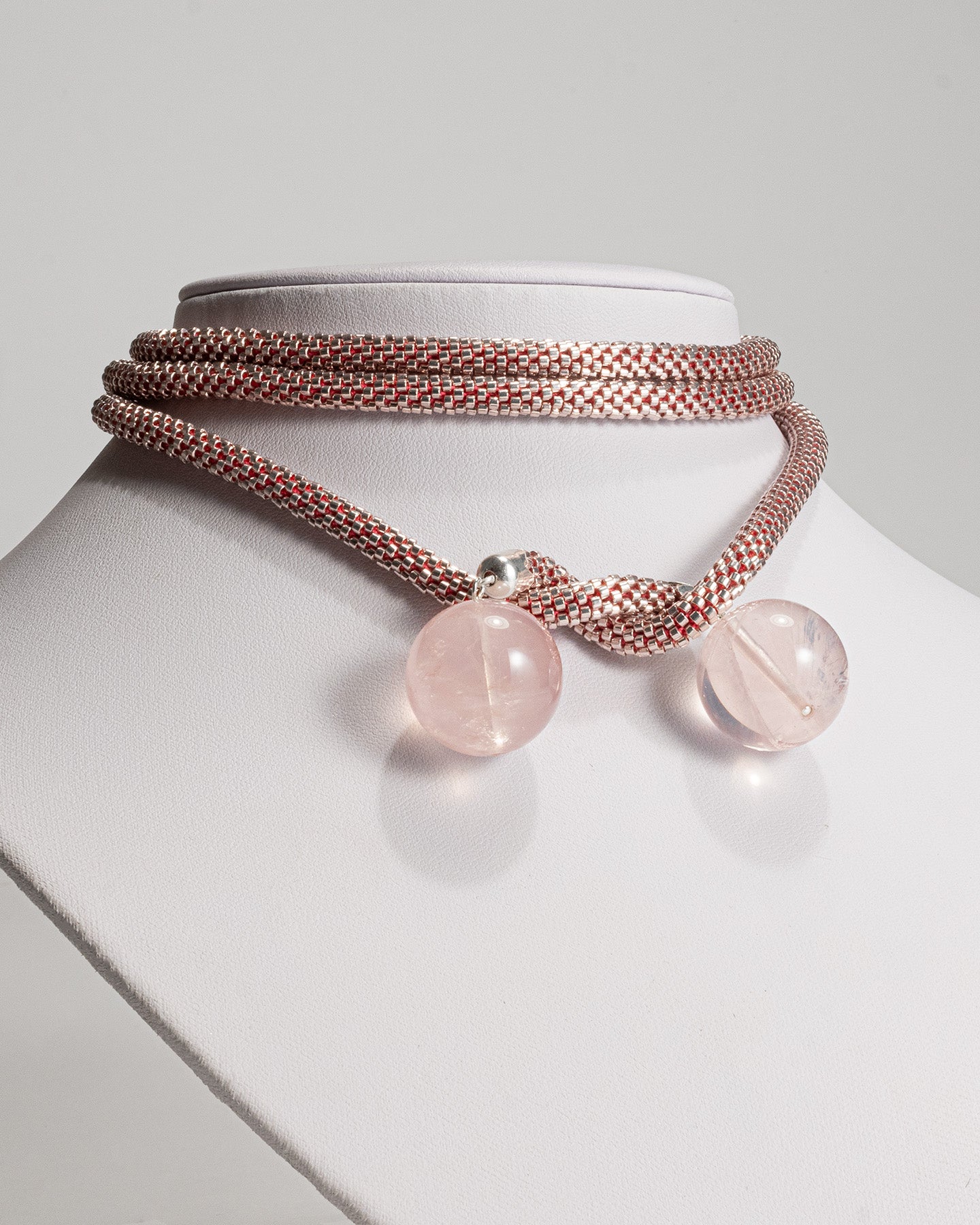 Elegant mono-strand necklace featuring Rose Quartz spheres and a Japanese beaded crochet rope, 106 cm in length.