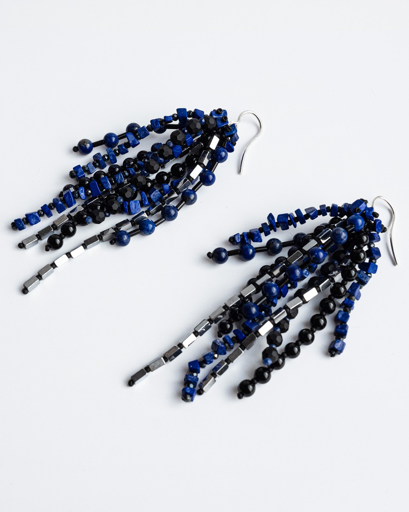 Long earrings featuring lapis lazuli, aventurine, black agate, spinel, hematite, and sterling silver, 8 cm in length, with elegant strands of natural gemstones.