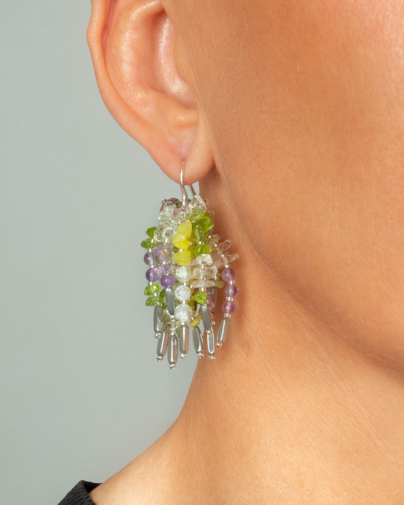 Mixed colorful short fringe earrings with quartz, hematite, amethyst, yellow sulfur, and olivine beads on silver hooks, 4 cm in length.