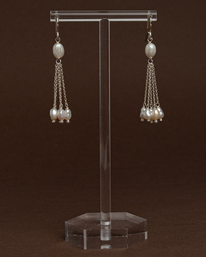 Baroque pearl drop earrings with sterling silver chains. Handmade modern bridal jewelry, perfect for weddings or minimalist statement looks.