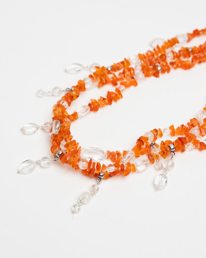 Handmade layered carnelian and quartz necklace with quartz charms. Unique natural stone design with elegance and energy.