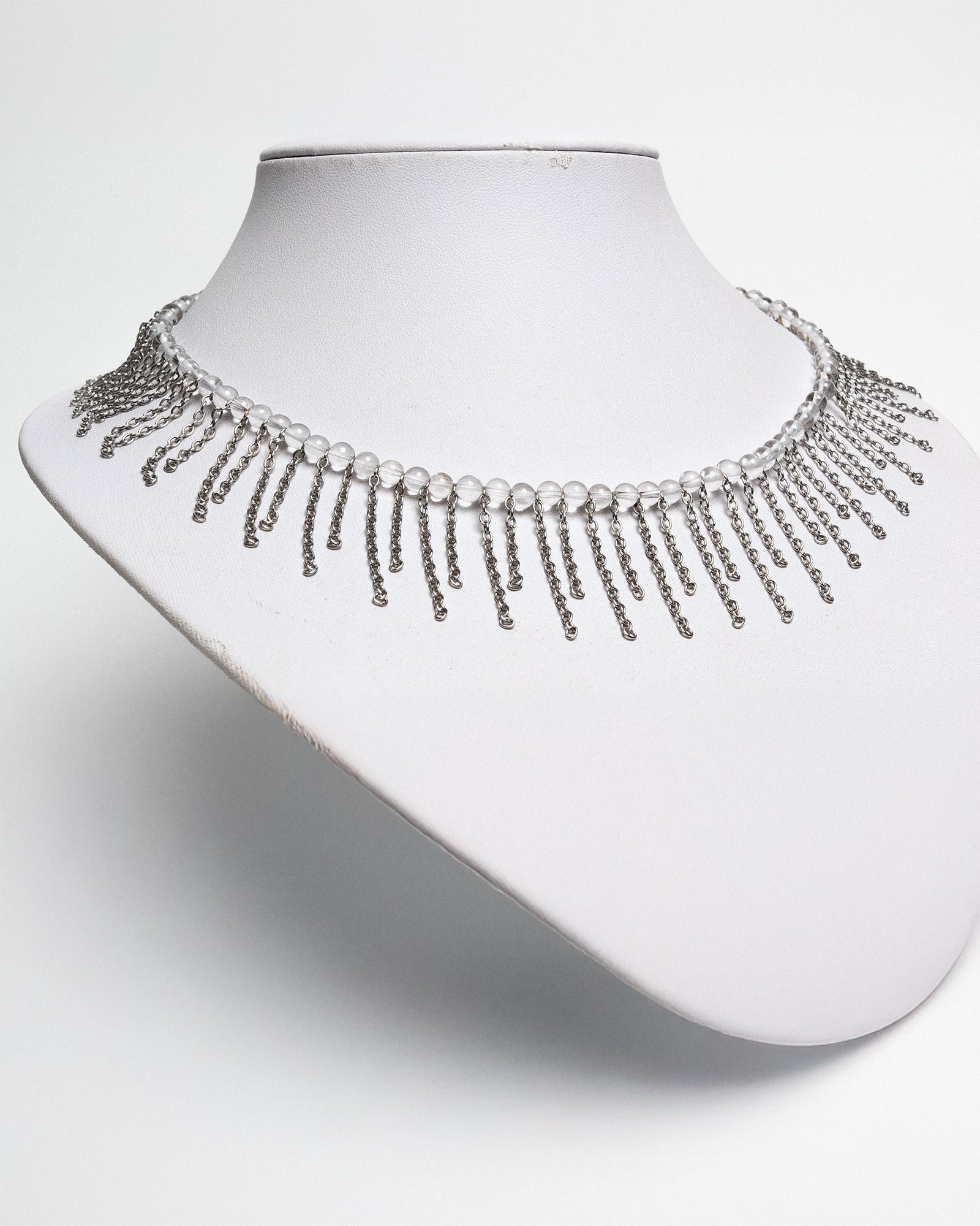 Quartz necklace with stainless steel fringe chains and luminous design