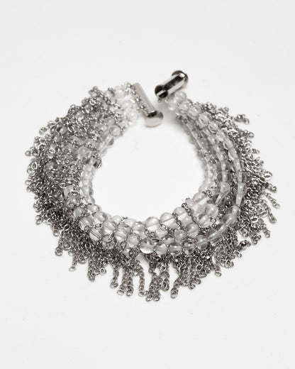 Pulsera de cuarzo y acero inoxidable con cierre magnético y cadenas tipo flecos