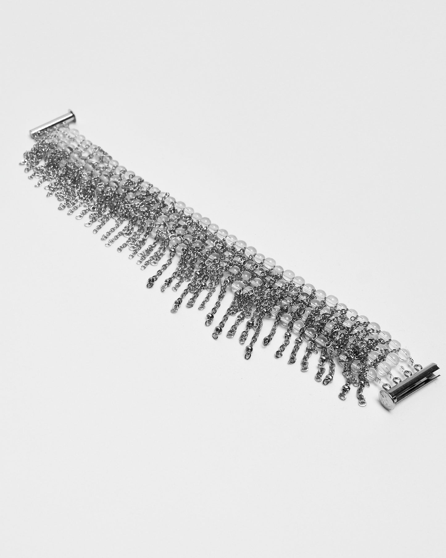 Pulsera de cuarzo y acero inoxidable con cierre magnético y cadenas tipo flecos