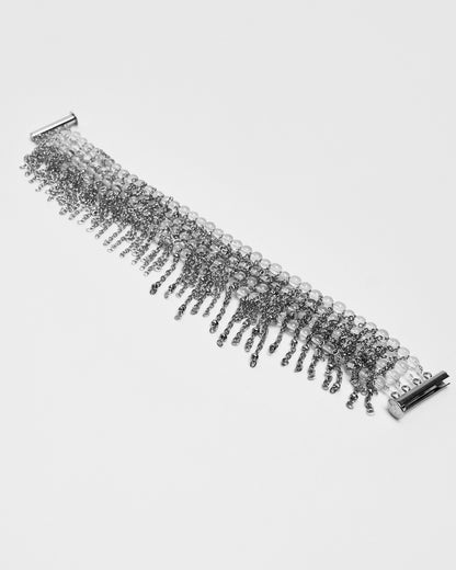 Pulsera de cuarzo y acero inoxidable con cierre magnético y cadenas tipo flecos