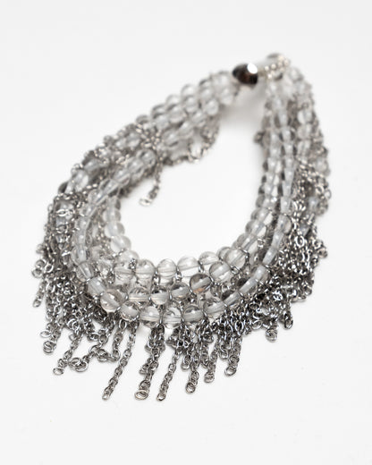 Pulsera de cuarzo y acero inoxidable con cierre magnético y cadenas tipo flecos