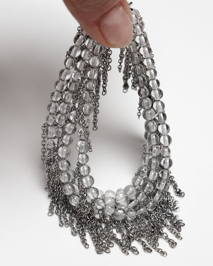 Pulsera de cuarzo y acero inoxidable con cierre magnético y cadenas tipo flecos