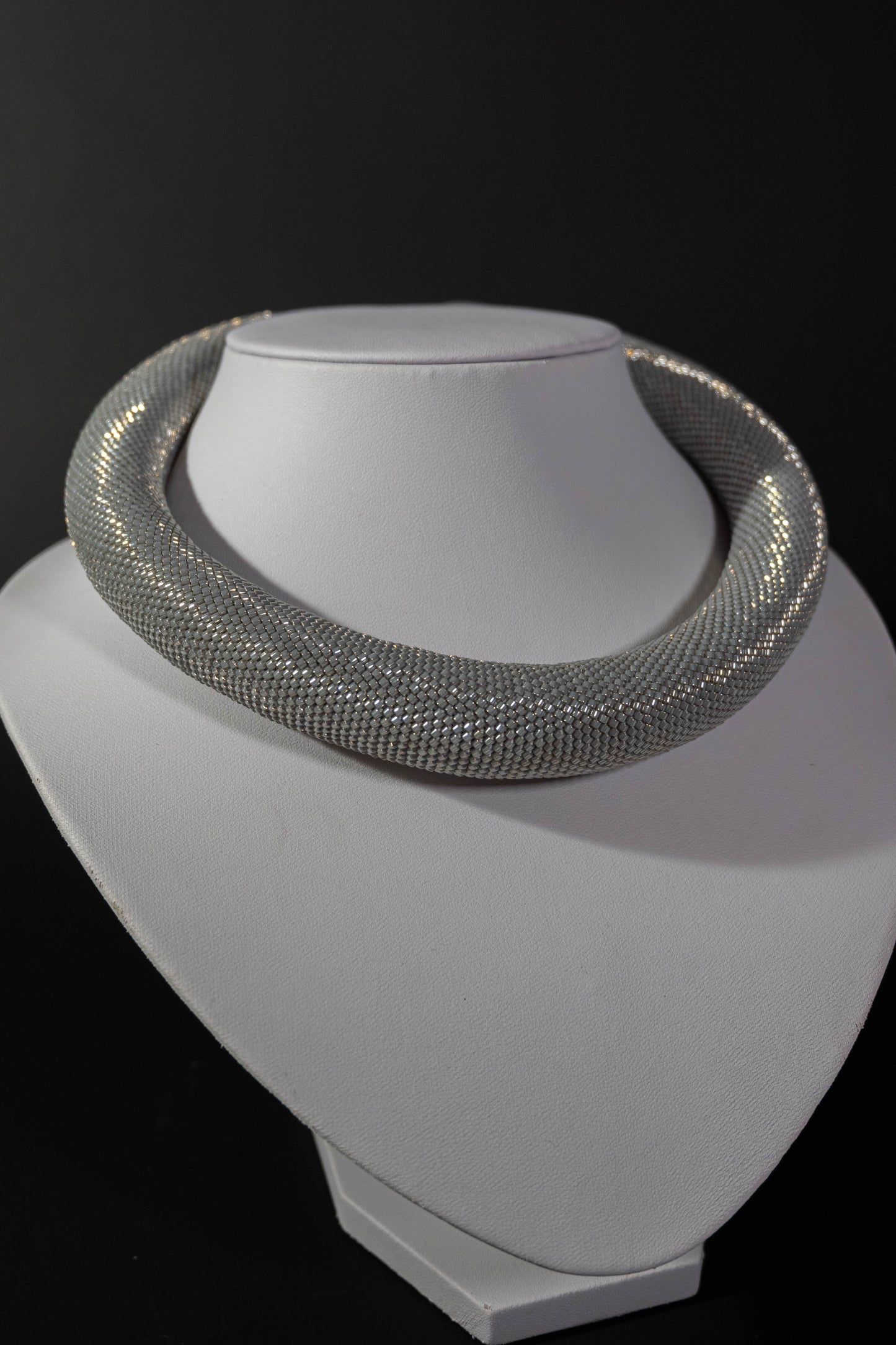 Elegant crochet choker necklace made with Japanese jewelry beads, featuring a sparkling clear quartz pendant and a silver lobster clasp, 40 cm in length.