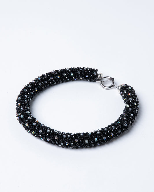 Spinel and crystals necklace featuring deep black spinel stones and shimmering crystals with a stainless steel T-bar clasp, 45 cm in length, offering bold elegance.